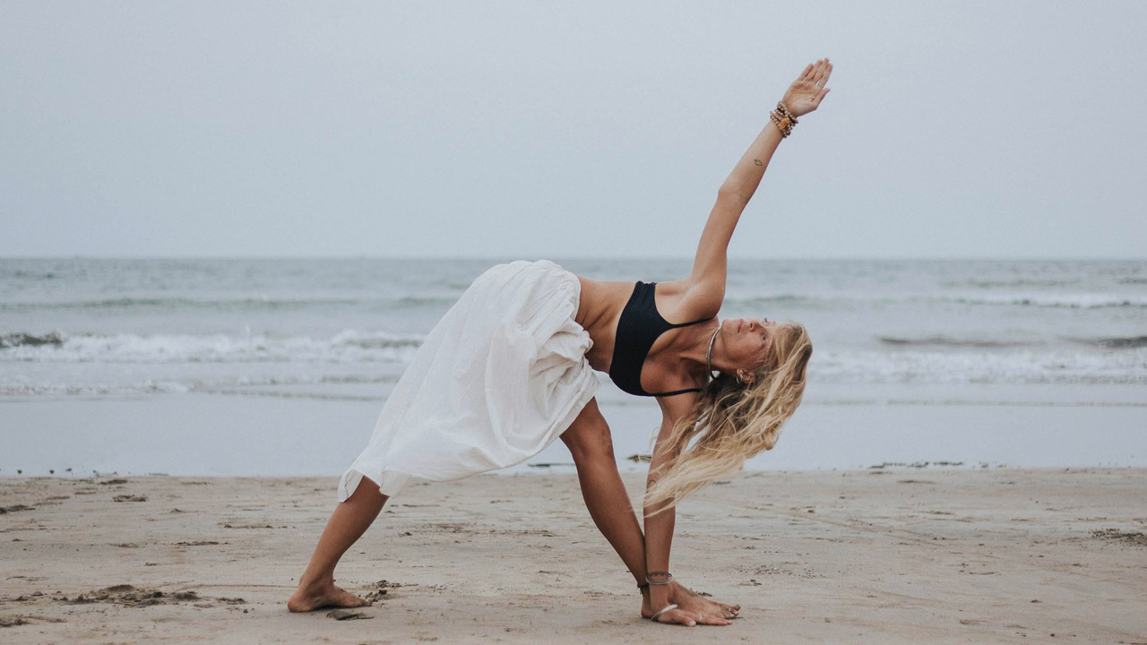 Utthita trikonasana - Postura del triángulo